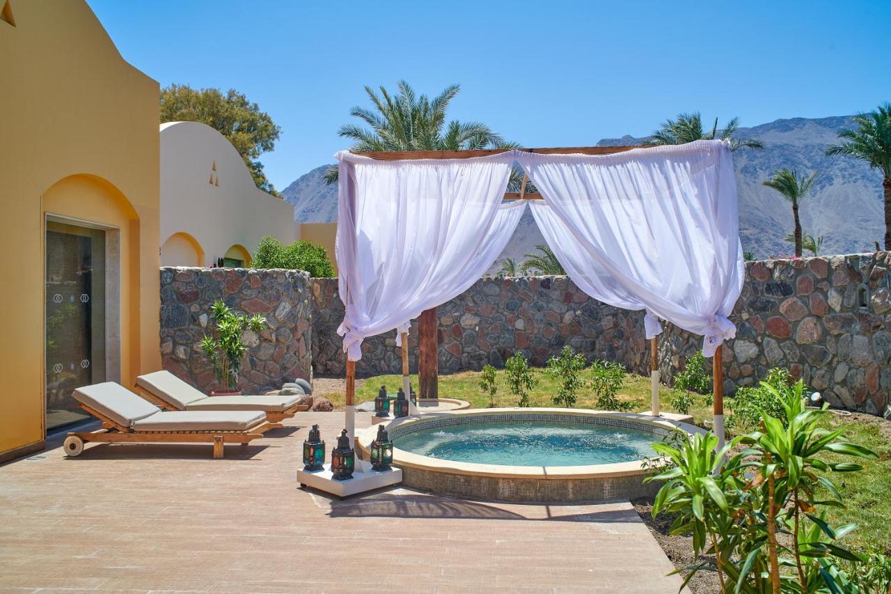 Mosaique Beach Resort Taba Heights Exterior photo A private pool at a hotel