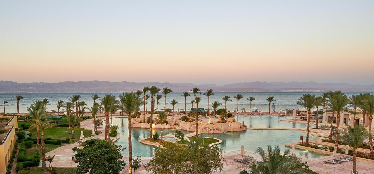 Mosaique Beach Resort Taba Heights Exterior photo View of the Red Sea from the Hilton Taba