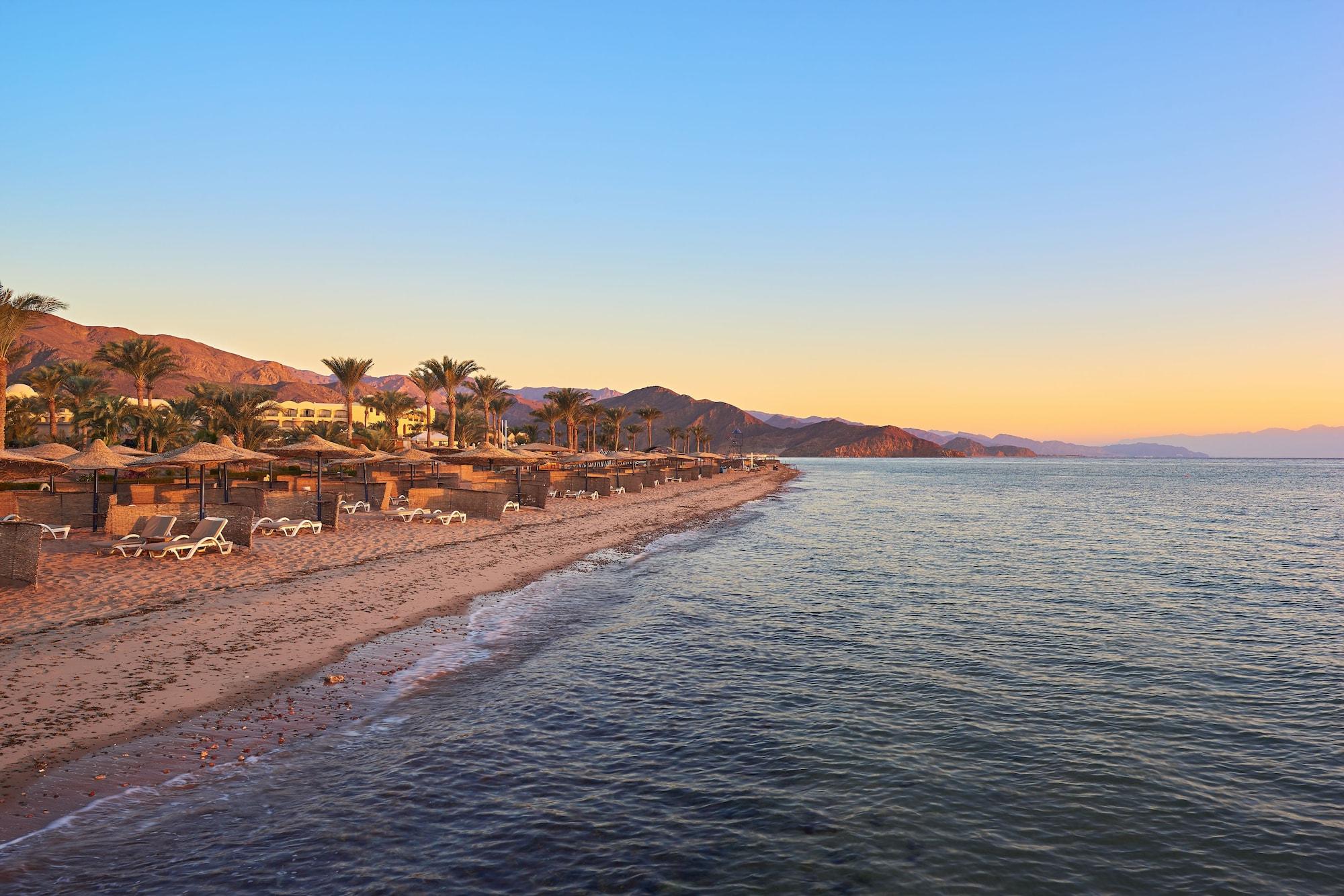 Mosaique Beach Resort Taba Heights Exterior photo Sunset at the Red Sea