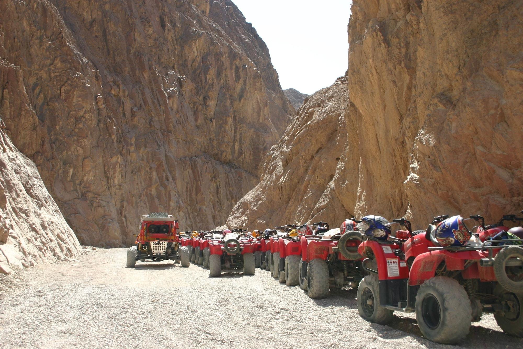 Mosaique Beach Resort Taba Heights Exterior photo Tourists on quad bikes in Wadi Rum