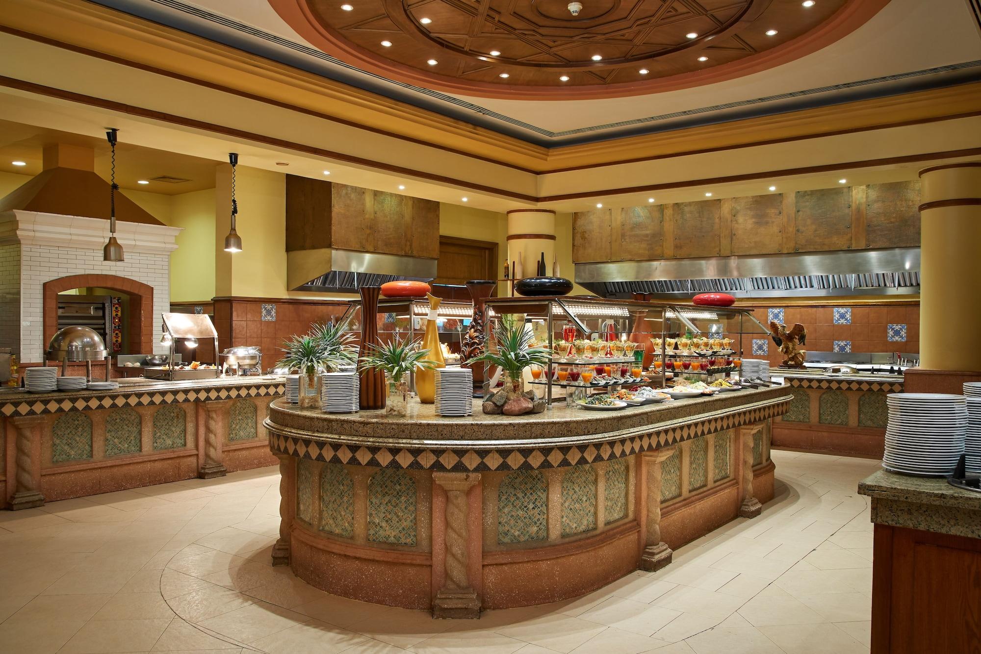 Mosaique Beach Resort Taba Heights Exterior photo A buffet at a hotel